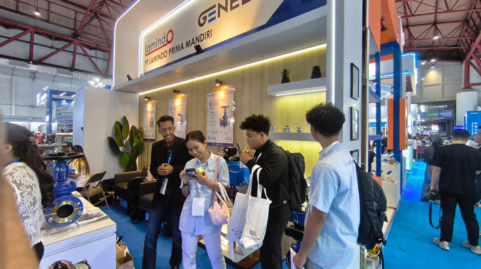 Busy visitor activity at PT Lamindo Prima Mandiri and GENEBRE booth during INDO WATER 2026 Day 2