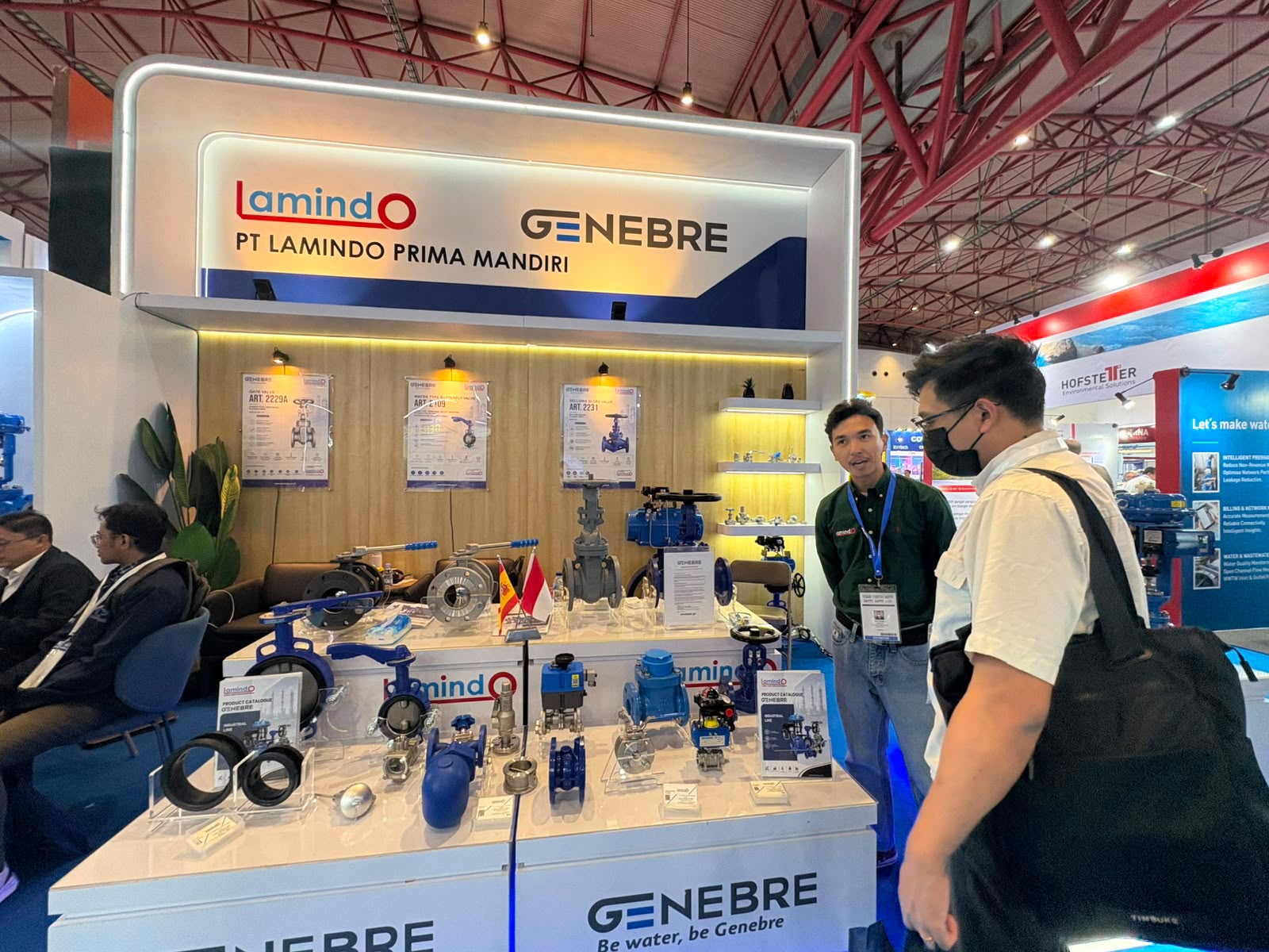 PT Lamindo Prima Mandiri discussing GENEBRE valve solutions with industry visitor at INDO WATER 2026